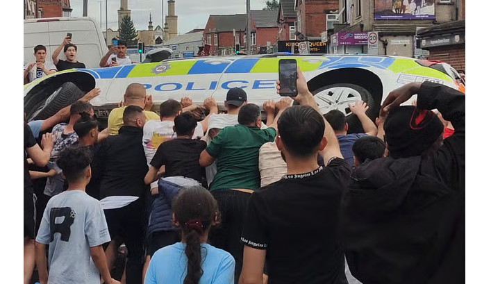 Leeds Riot: Police Attacked Amid Efforts to Protect Social Workers in Child Welfare Case